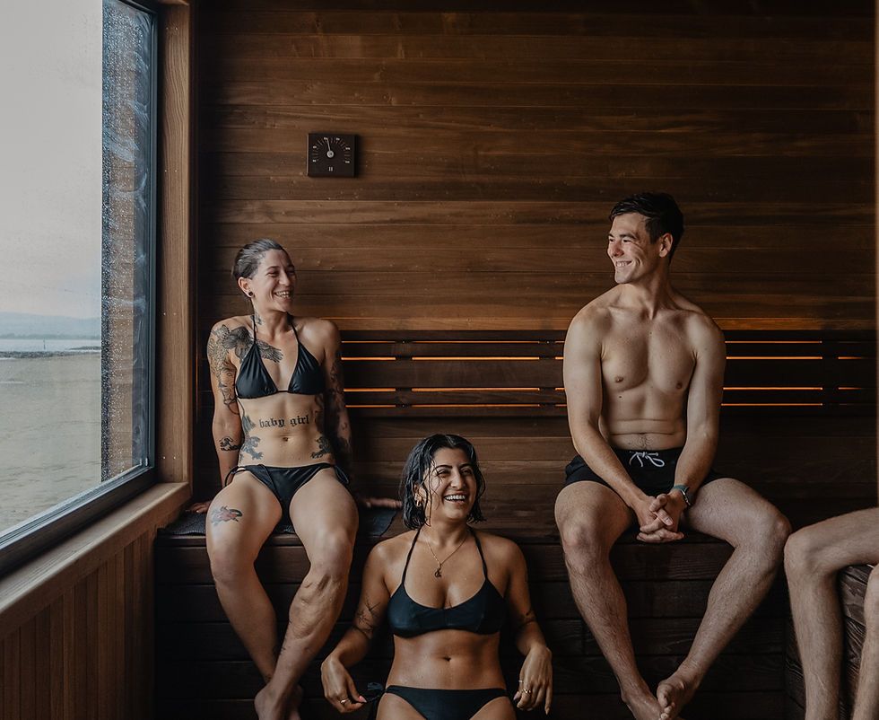Group of friends enjoying a communal sauna session together